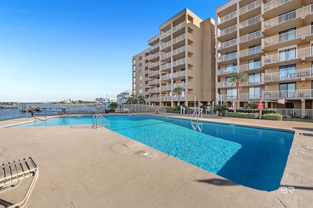 community pool featuring a patio area