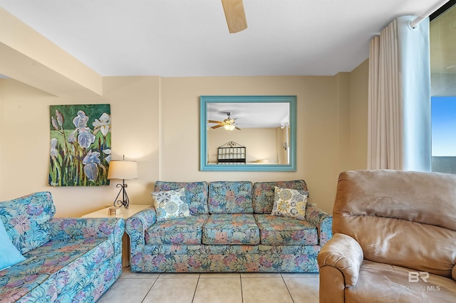 tiled living area featuring a ceiling fan