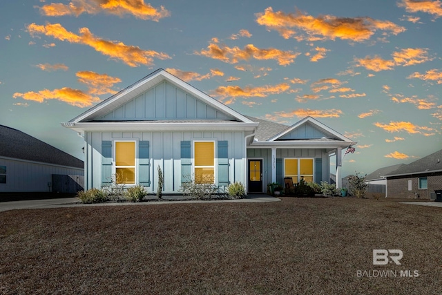 craftsman inspired home featuring a yard