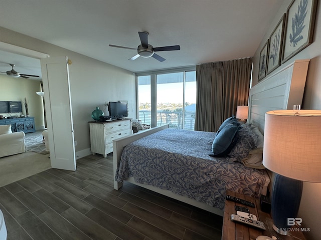 bedroom featuring ceiling fan and dark hardwood / wood-style flooring