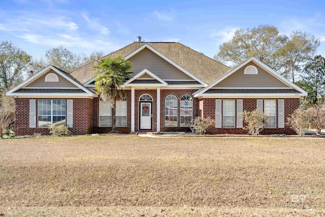 view of front of home with a front yard