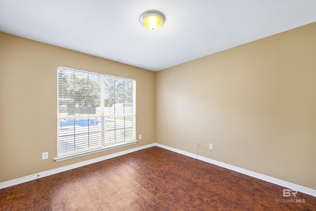 empty room featuring hardwood / wood-style floors