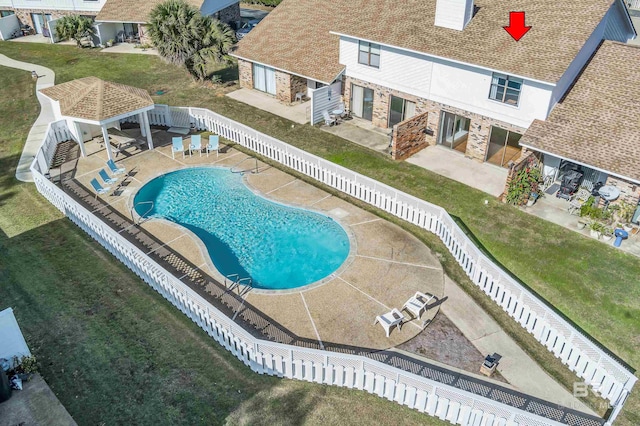 view of pool with a gazebo, a yard, and a patio