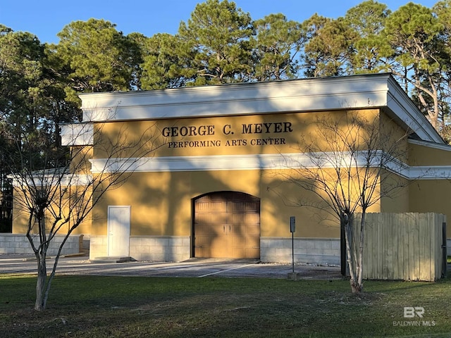 view of building exterior with a garage