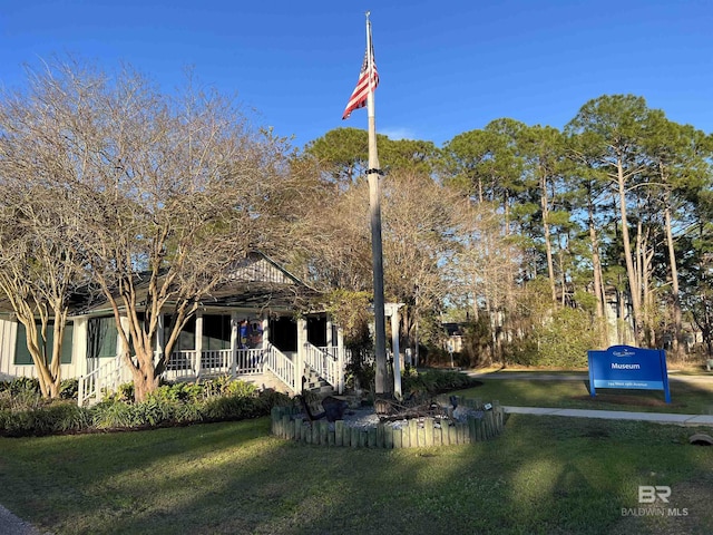 328 Clubhouse Dr Unit 1B, Gulf Shores, AL 36542 - surrounding community featuring a yard