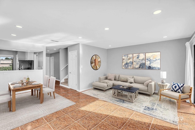 living room featuring tile patterned flooring