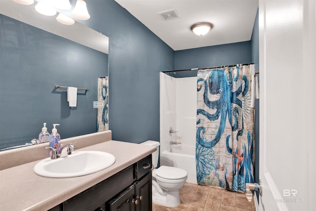 full bathroom featuring vanity, toilet, and shower / bath combination with curtain