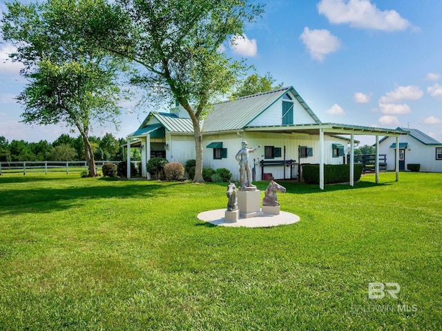 24235 County Road 87, Robertsdale, AL 36567 - rear view of property with board and batten siding, metal roof, and a standing seam roof