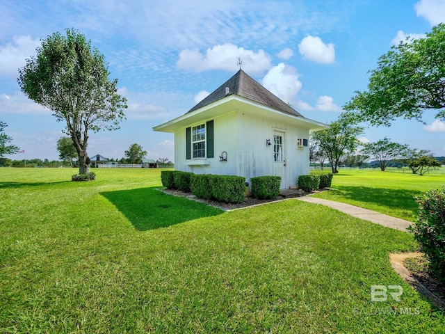 24235 County Road 87, Robertsdale, AL 36567 - view of home's exterior featuring a yard and roof with shingles