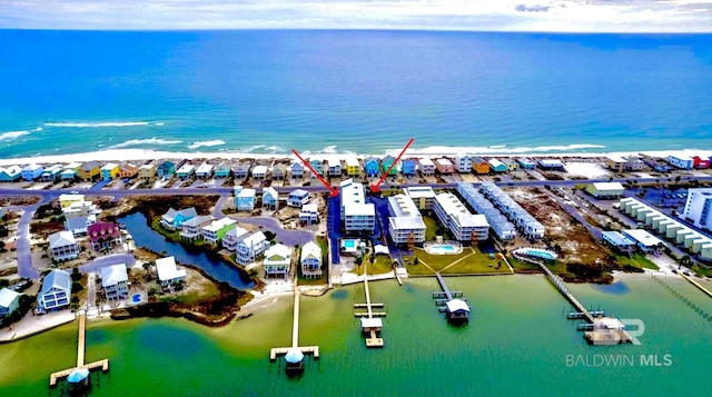 birds eye view of property featuring a water view