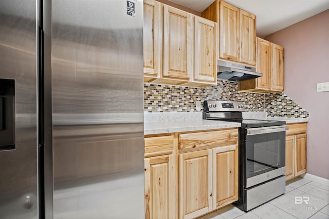 kitchen featuring light brown cabinets, tasteful backsplash, light tile patterned flooring, and stainless steel appliances