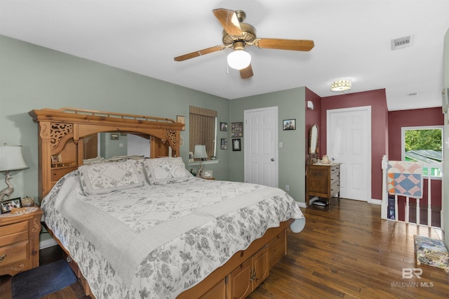 31375 Stagecoach Rd, Spanish Fort, AL 36527 - bedroom featuring dark wood finished floors, baseboards, and a ceiling fan