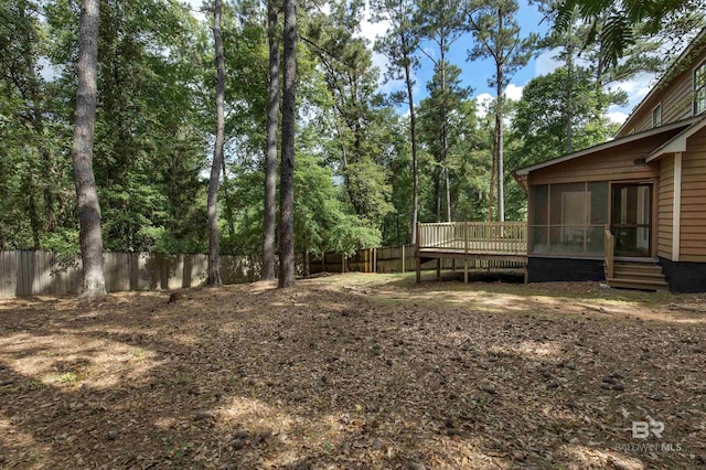31375 Stagecoach Rd, Spanish Fort, AL 36527 - fenced backyard with a sunroom and a deck