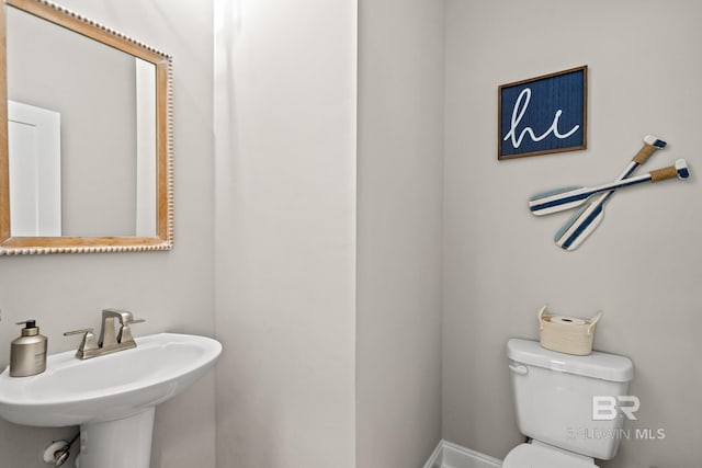 bathroom with toilet and sink