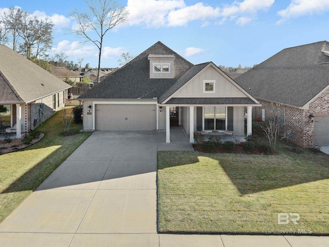 view of front facade featuring board and batten siding, concrete driveway, a front yard, and a shingled roof