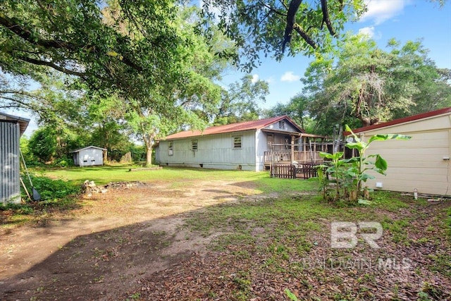 4918 Quimby Dr, Mobile, AL 36619 - view of green lawn with an outdoor structure