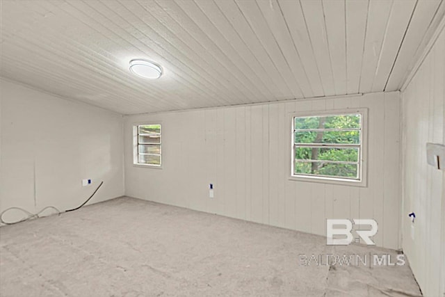 4918 Quimby Dr, Mobile, AL 36619 - carpeted empty room featuring wooden ceiling and wood walls