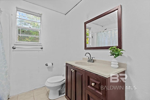 4918 Quimby Dr, Mobile, AL 36619 - bathroom featuring vanity, tile patterned floors, toilet, and healthy amount of natural light
