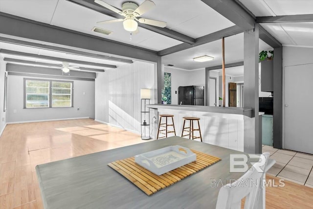 4918 Quimby Dr, Mobile, AL 36619 - dining space with ceiling fan, beamed ceiling, and wood finished floors