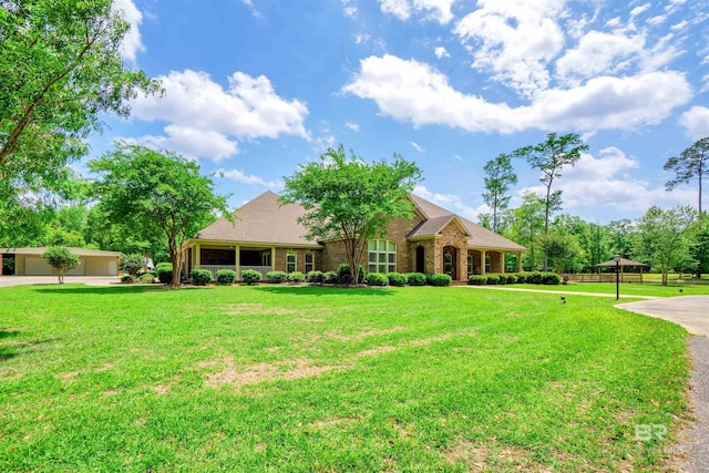 917 Rockaway Creek Rd, Atmore, AL 36502 - view of front of property featuring a front yard and brick siding