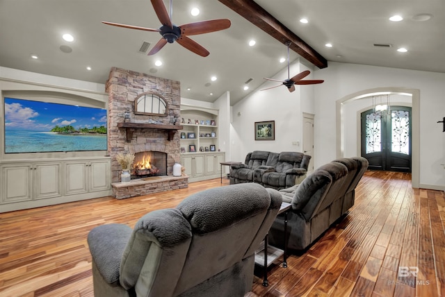 917 Rockaway Creek Rd, Atmore, AL 36502 - living room with arched walkways, a ceiling fan, french doors, and wood-type flooring