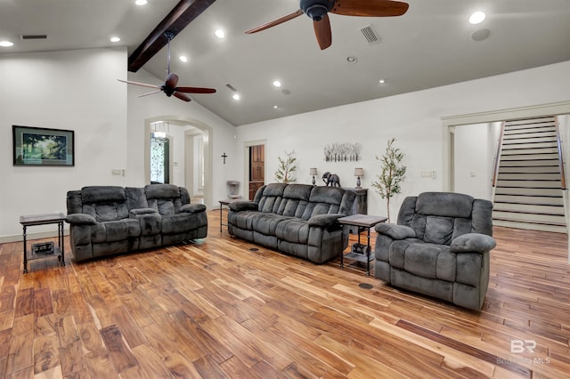 917 Rockaway Creek Rd, Atmore, AL 36502 - living area featuring lofted ceiling with beams, arched walkways, ceiling fan, and visible vents