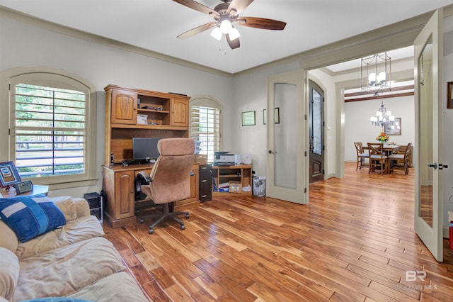 917 Rockaway Creek Rd, Atmore, AL 36502 - home office with ornamental molding, light wood-style flooring, and ceiling fan with notable chandelier