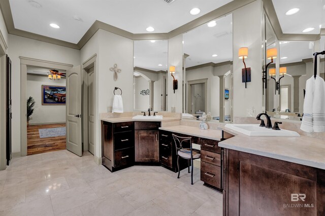 917 Rockaway Creek Rd, Atmore, AL 36502 - bathroom featuring tile patterned floors, recessed lighting, decorative columns, and vanity