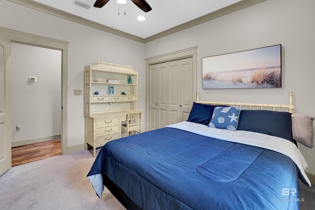 917 Rockaway Creek Rd, Atmore, AL 36502 - bedroom with a closet, ceiling fan, carpet flooring, baseboards, and visible vents