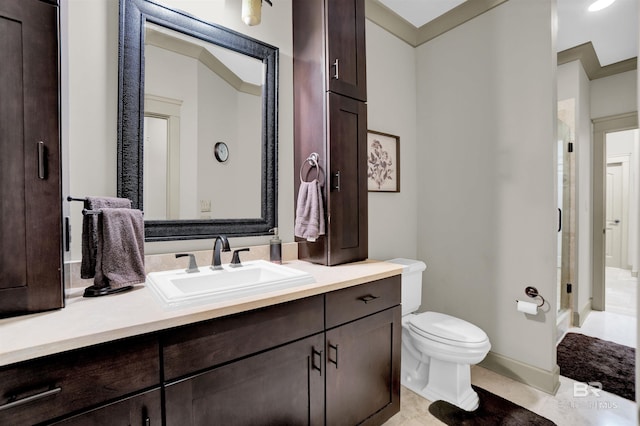 917 Rockaway Creek Rd, Atmore, AL 36502 - bathroom with a stall shower, baseboards, toilet, tile patterned floors, and vanity