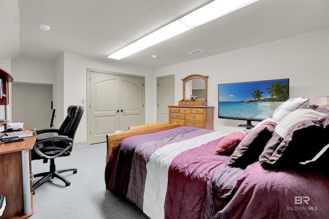 917 Rockaway Creek Rd, Atmore, AL 36502 - carpeted bedroom featuring visible vents and a closet