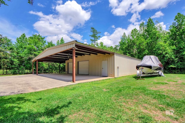 917 Rockaway Creek Rd, Atmore, AL 36502 - view of car parking featuring a detached garage