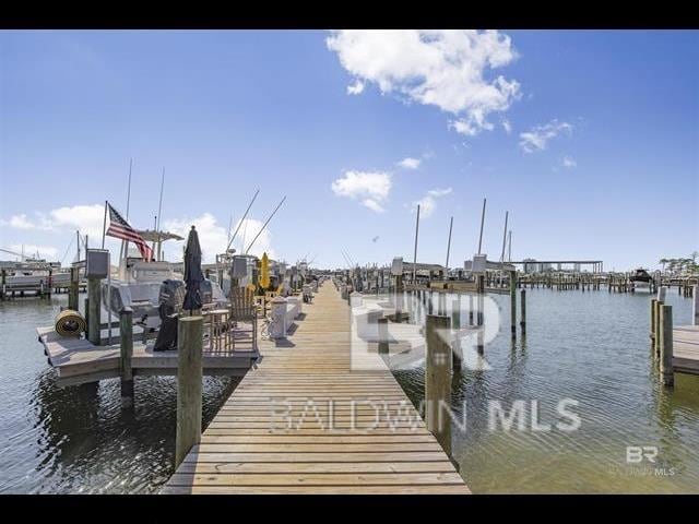 dock area featuring a water view