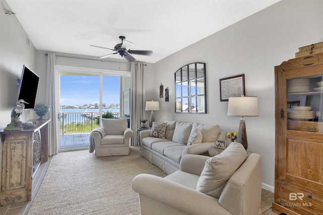 living room featuring ceiling fan