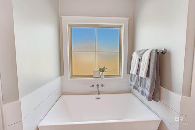 bathroom with a bathing tub