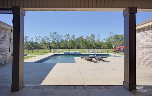 view of swimming pool with a patio area and a playground