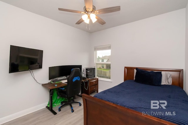12927 Sanderling Loop, Spanish Fort, AL 36527 - bedroom with wood finished floors, a ceiling fan, and a desk