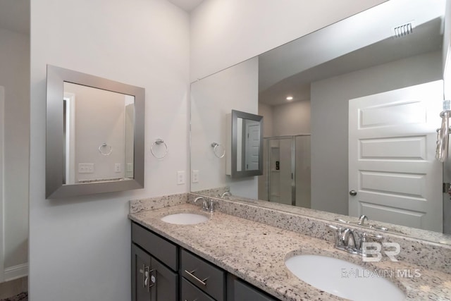 12927 Sanderling Loop, Spanish Fort, AL 36527 - full bathroom featuring double vanity and a shower stall