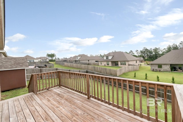 12927 Sanderling Loop, Spanish Fort, AL 36527 - wooden deck with a residential view and a fenced backyard