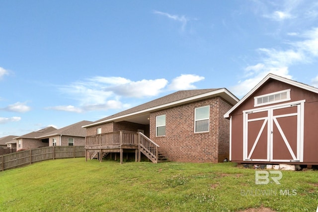 12927 Sanderling Loop, Spanish Fort, AL 36527 - rear view of house featuring stairs, a shed, a wooden deck, and brick siding