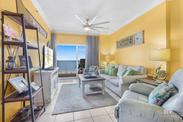 26750 Perdido Beach Blvd Unit 708, Orange Beach, AL 36561 - tiled living room with ceiling fan, ornamental molding, and a textured ceiling