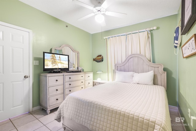 26750 Perdido Beach Blvd Unit 708, Orange Beach, AL 36561 - bedroom with light tile patterned floors and a ceiling fan