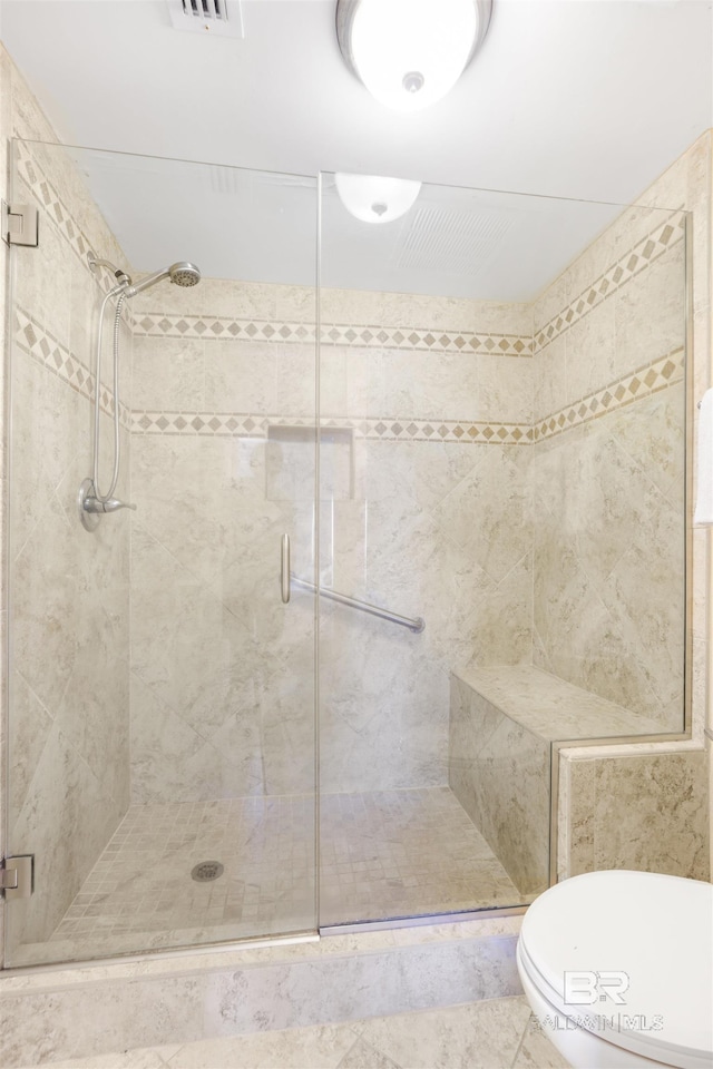 26750 Perdido Beach Blvd Unit 708, Orange Beach, AL 36561 - bathroom with a shower stall and toilet