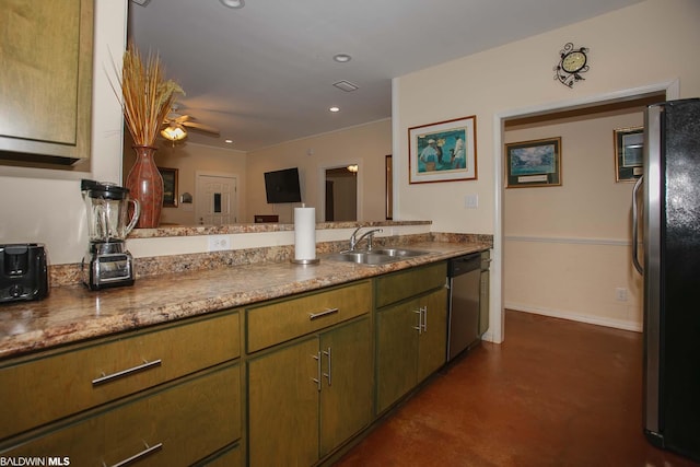 kitchen featuring ceiling fan, appliances with stainless steel finishes, sink, and light stone countertops