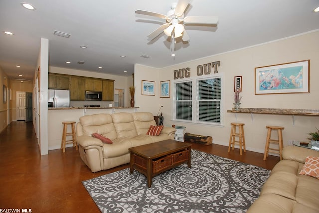 living room with crown molding and ceiling fan