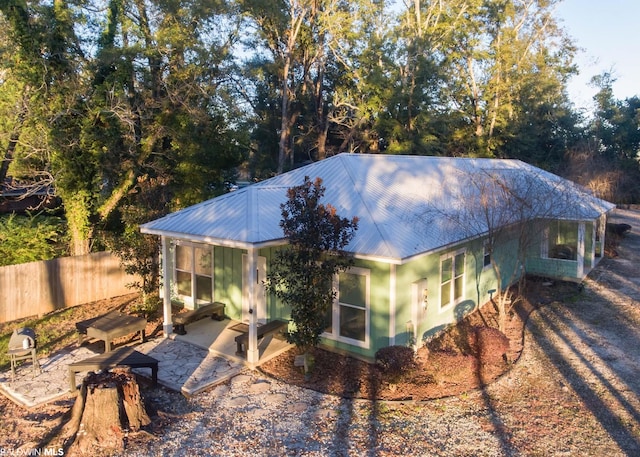 back of house with a patio area