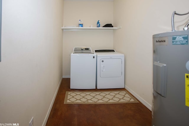 laundry area with washer and clothes dryer and water heater