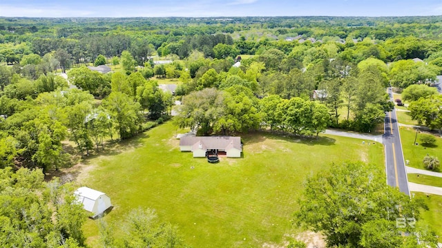 drone / aerial view with a forest view