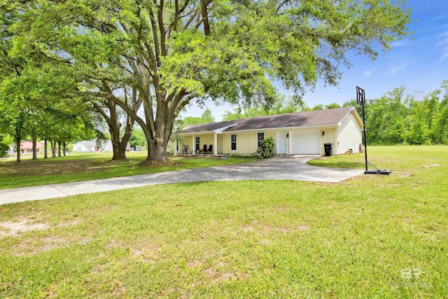 single story home featuring aphalt driveway, a garage, and a front lawn