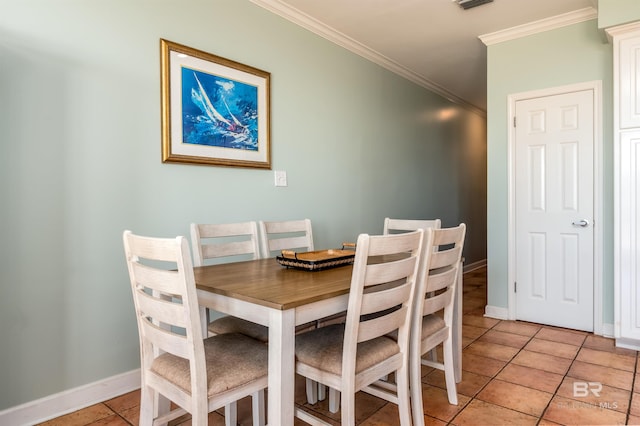 tiled dining area with crown molding